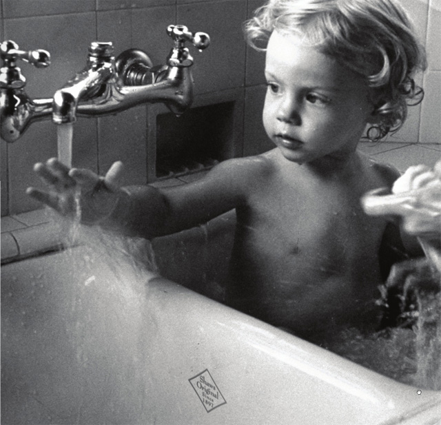 Toddler Bathing in Rohl Shaws Original Fireclay Sink